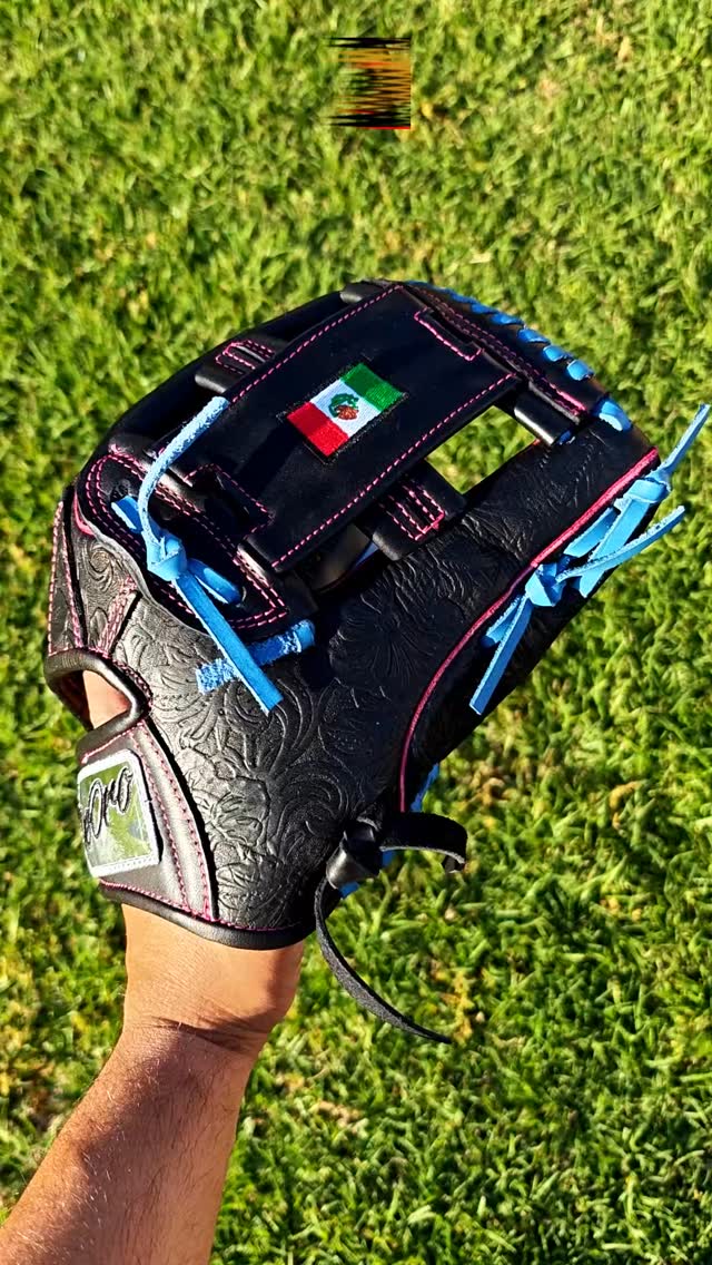 Black floral embossed leather paired with vibrant pink stitching and electric blue laces—this custom build is pure artistry.From the detailed texture to the clean Mexico flag on the web, this glove is built to stand out on any diamond.Rate this look from 1-10! 👇#deorosports #customgloves #baseball #softball #fyp #mexicobaseball #baseballglove #glovecollector