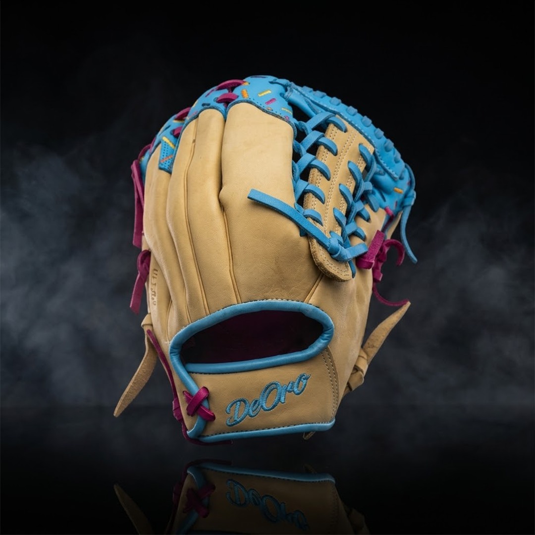The 'Cotton Candy' Dream. 🍬⚾️ This isn't just a glove; it's a statement. Featuring premium tan leather paired with vibrant blue webbing and pink accents, this custom design is built to perform and look incredible doing it.DeOro Sports
Custom yours now at deorosports.com#deorosports #customgloves #baseball #softball #fyp
