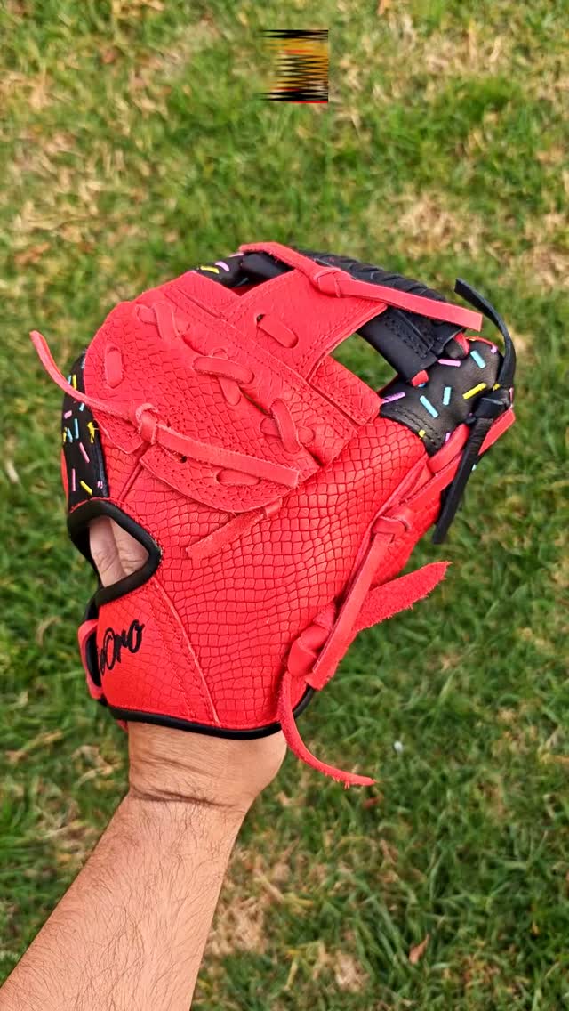 Dangerous look, sweet details. 🐍🧁 This custom build pairs a textured red snakeskin shell with smooth black leather accents and a pop of embroidered sprinkles on the finger back and wrist.The perfect mix of attitude and flavor for the diamond.Rate this custom look from 1-10! 👇#deorosports #customgloves #baseball #softball #fyp #snakeskinleather #baseballglove #glovegains #baseballswag